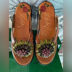 Beautiful leather work with florals toe post sandals, never worn